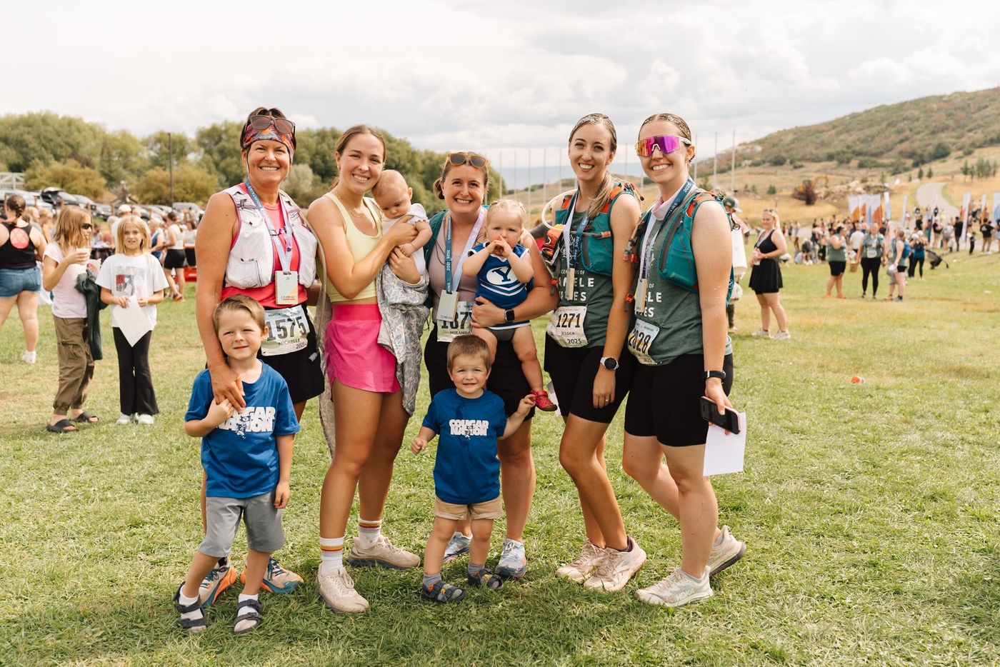 Finishers with their kids in the finish line field.