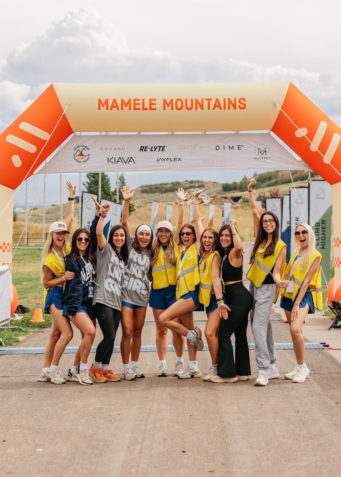 Racers gathered under the Mamele Mountains start arch.